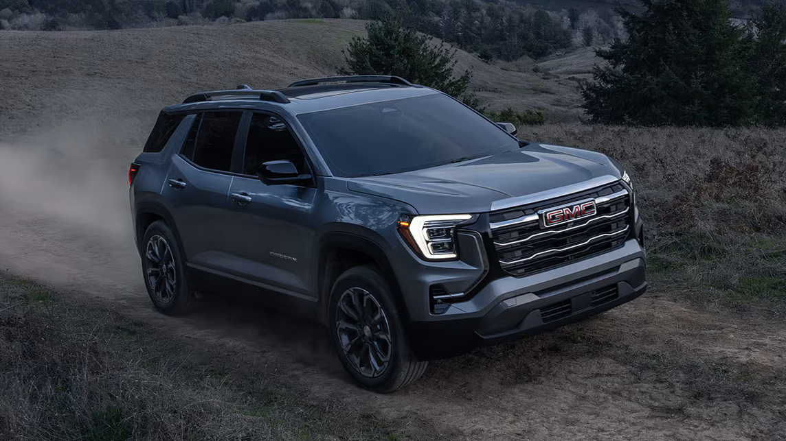 Gray 2027 GMC Terrain on a dirt trail